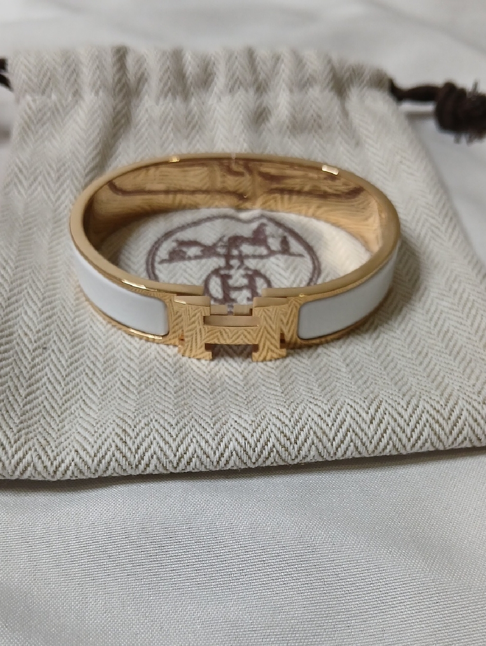 Hermes White Enamel and Gold H Clic Clac Bracelet
